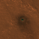 NASA’s InSight on the Martian surface. The odd teal color is not the actual color of the probe, but rather a visual artifact caused by reflected light. The dark splotch around the lander was caused by InSight’s retrorockets during its descent.